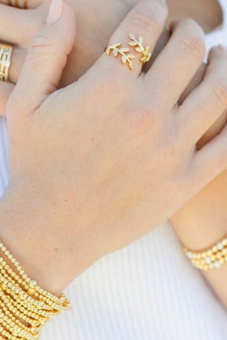 3mm Bead with 5mm Accent Gold Stretch Bracelet - Fleur-De-Lis Boutique