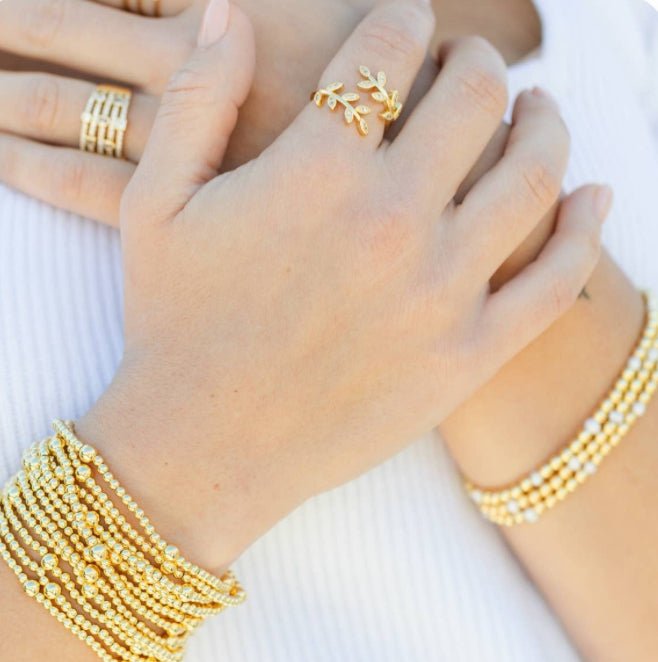 3mm Bead with 5mm Accent Gold Stretch Bracelet - Fleur-De-Lis Boutique